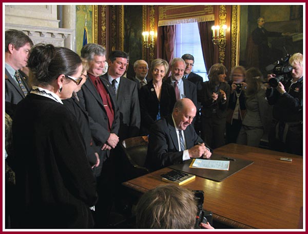 Gov. Doyle signs AB-250 into law.